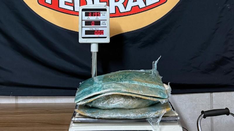 PF prende traficante com droga enrolada ao corpo no aeroporto de Porto Velho