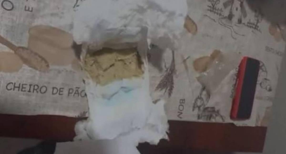 Homem é preso com pistola furtada da PM e drogas escondidas em fralda em RO